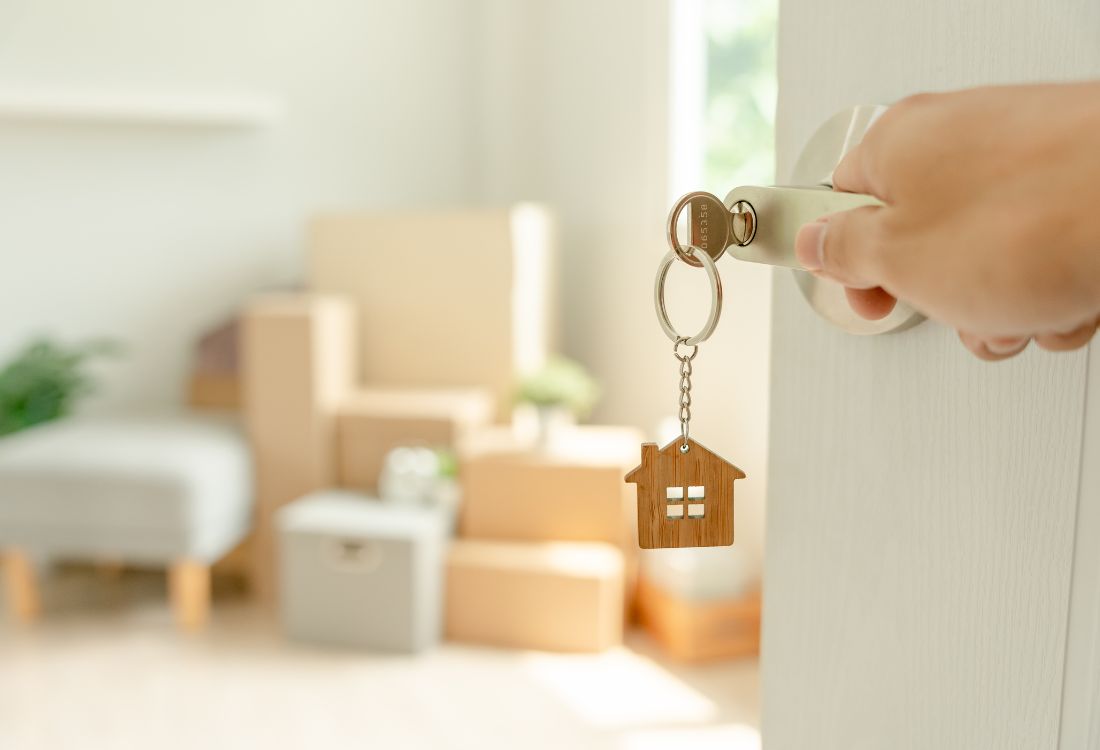 A key dangling in the door of a new home as the person relocates to Australia.